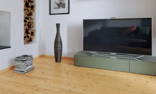 Massivholzparkett Massivholzdielen bzw. Massivholzparkett in sibirischer Lärche geölt in einem Wohnzimmer
