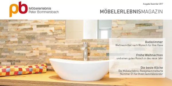 Waschtischplatte aus Eiche mit rundem, weißem Aufsatzwaschbecken und verchromtem Einhebelmischer vor Wand mit beige-brauner Steinverkleidung, daneben bunte Handtücher.